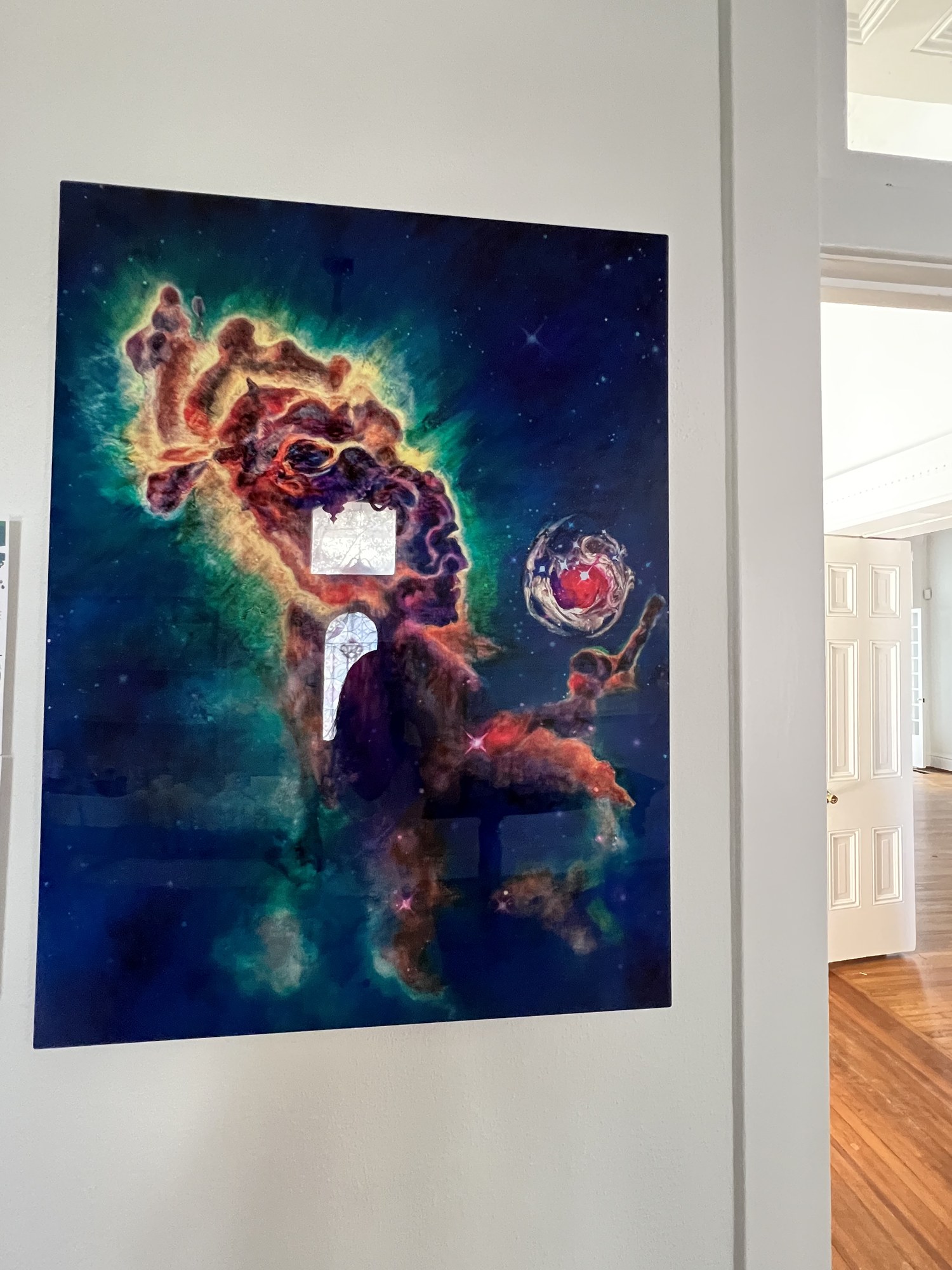 The Plexi Edition of Prometheus’s Fire, face-mounted in acrylic and hung flush on a white wall.
