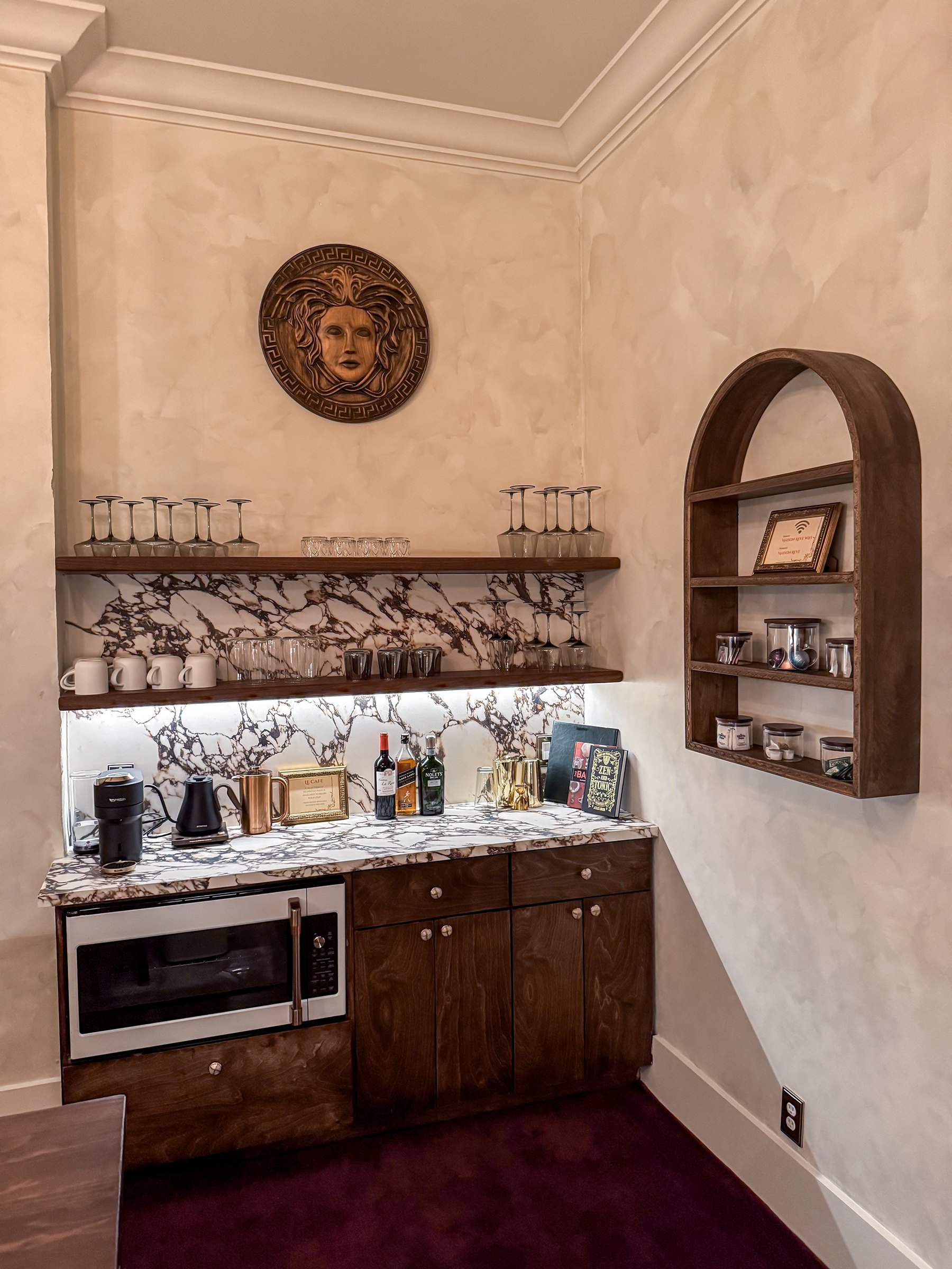 The bar nook, glassware and the medallion